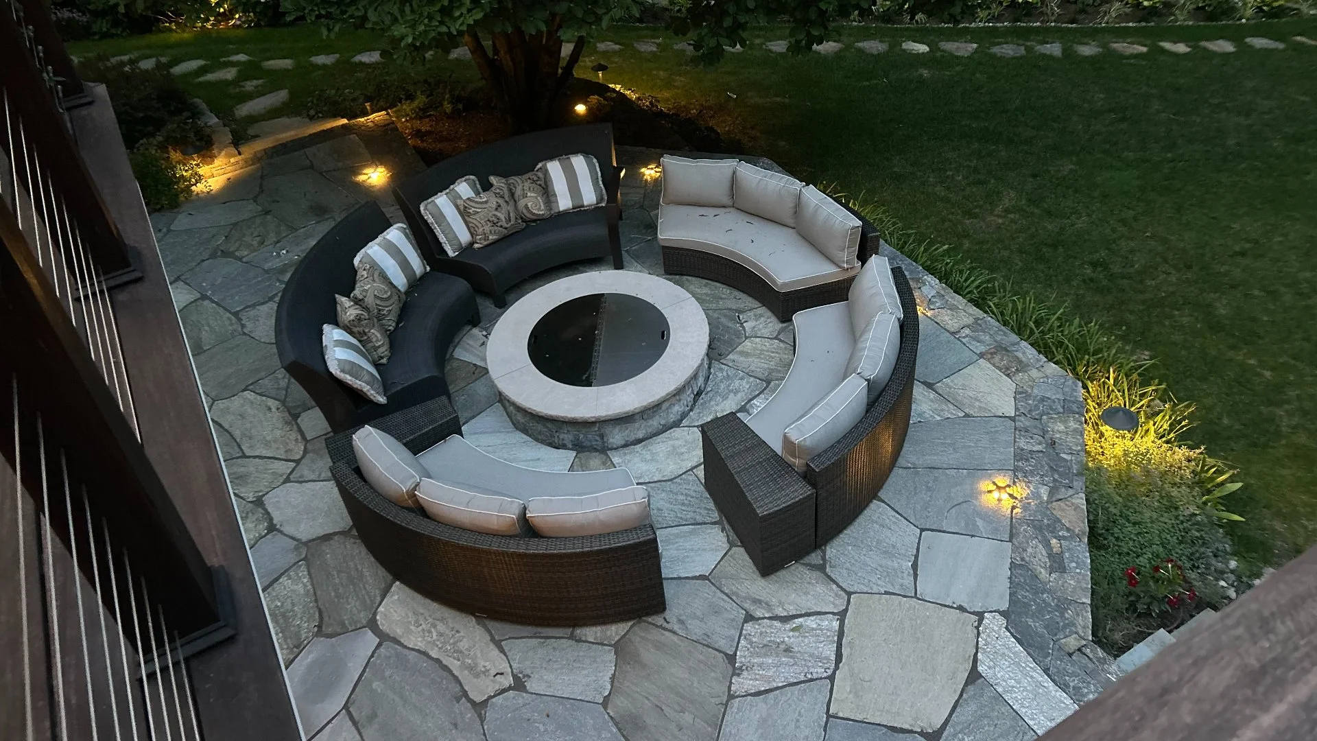 Stone patio with furniture and shade planning in Fairfield County