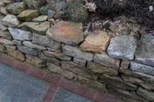 Comparing dry-laid vs. Wet-laid stone walls