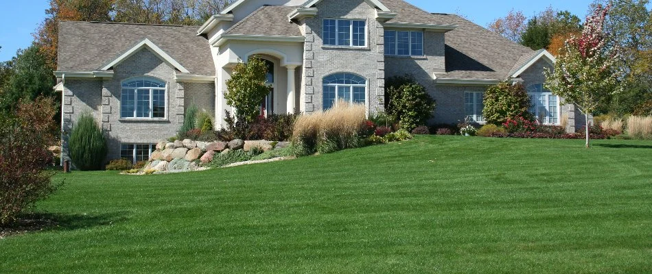 Large, green lawn in front of a house in White Plains, NY.