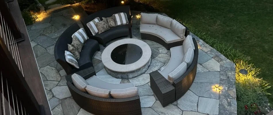 Patio area with furniture on a property in White Plains, NY.