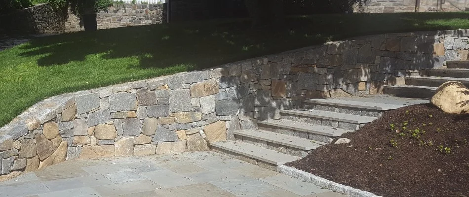 Outdoor steps next to a retaining wall in White Plains, NY.