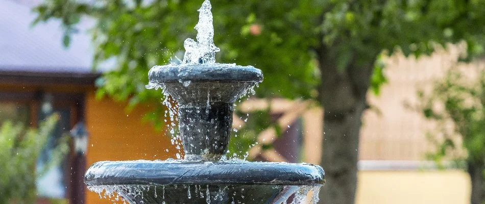 Water fountain spraying water on a property in White Plains, NY.